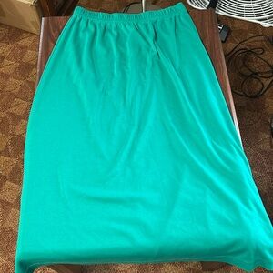 Women’s Large green skirt with lower side buttons